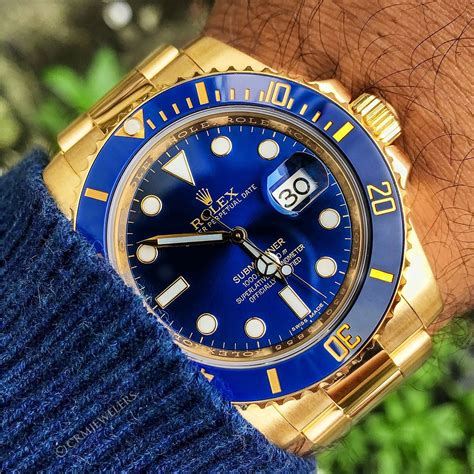 gold Rolex submariner blue face